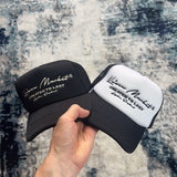 AUTOGRAPH TRUCKER HAT BLACK